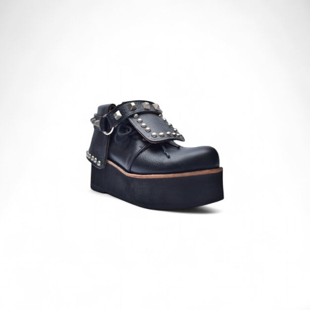 BOTIN LOLA DE PLATAFORMA NEGRO DE CUERO